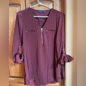 Pretty shirt dress up with business or dress down with some cute jeans! Size M.